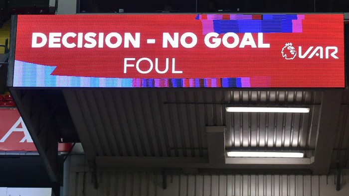 LIVERPOOL, ENGLAND - OCTOBER 31: The big screen shows the VAR decision for Diogo Jota of Liverpool goal decision during the Premier League match between Liverpool and West Ham United at Anfield on October 31, 2020 in Liverpool, England. Sporting stadiums around the UK remain under strict restrictions due to the Coronavirus Pandemic as Government social distancing laws prohibit fans inside venues resulting in games being played behind closed doors. (Photo by Peter Powell - Pool/Getty Images)