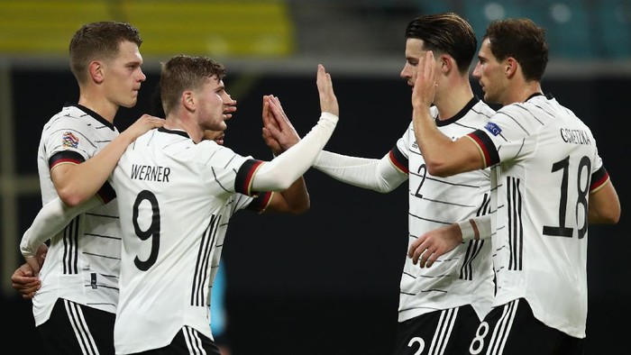 LEIPZIG, GERMANY - NOVEMBER 14: Timo Werner #9 of Germany celebrates his teams third goal with teammates  during the UEFA Nations League group stage match between Germany and Ukraine at Red Bull Arena on November 14, 2020 in Leipzig, Germany. (Photo by Maja Hitij/Getty Images)