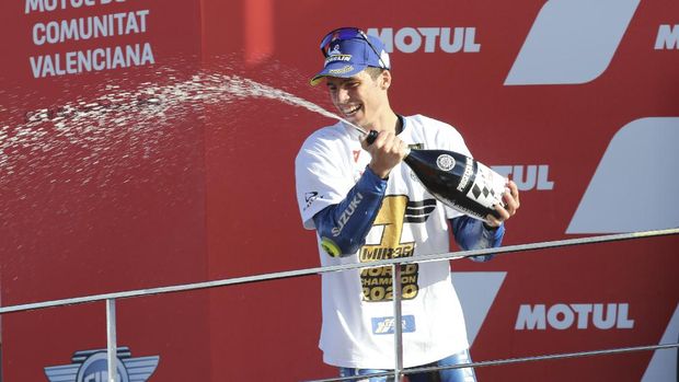 2020 World champion, Spain's rider Joan Mir of the Team SUZUKI ECSTAR celebrates after the end of the MotoGP race during Valencia Grand Prix in Ricardo Tormo Circuit in Valencia, Spain, Sunday, Nov. 15, 2020. (AP Photo/Alberto Saiz)