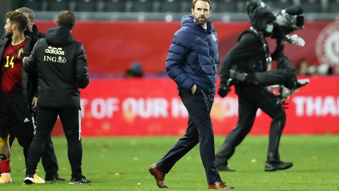 England head coach Gareth Southgate walks on the pitch following the UEFA Nations League soccer match between Belgium and England at the King Power stadium in Leuven, Belgium, Sunday, Nov. 15, 2020. (AP Photo/Francisco Seco)