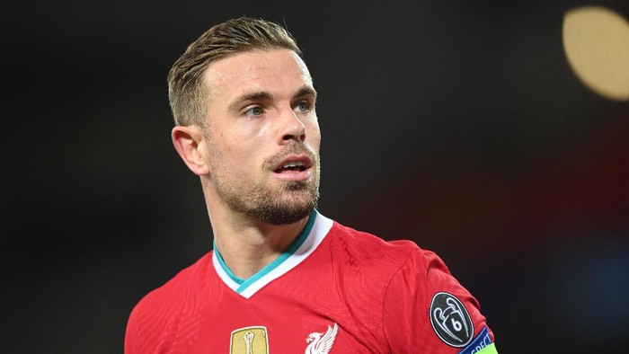 LIVERPOOL, ENGLAND - OCTOBER 27: Jordan Henderson of Liverpool in action during the UEFA Champions League Group D stage match between Liverpool FC and FC Midtjylland at Anfield on October 27, 2020 in Liverpool, England. Sporting stadiums around the UK remain under strict restrictions due to the Coronavirus Pandemic as Government social distancing laws prohibit fans inside venues resulting in games being played behind closed doors. (Photo by Michael Regan/Getty Images)