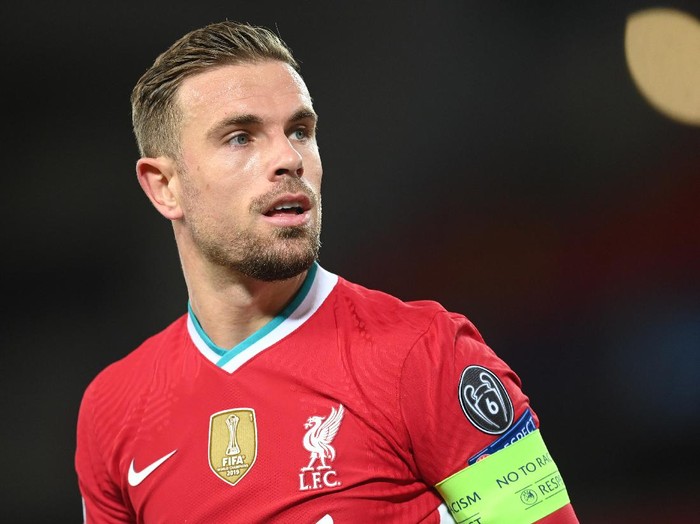 LIVERPOOL, ENGLAND - OCTOBER 27: Jordan Henderson of Liverpool in action during the UEFA Champions League Group D stage match between Liverpool FC and FC Midtjylland at Anfield on October 27, 2020 in Liverpool, England. Sporting stadiums around the UK remain under strict restrictions due to the Coronavirus Pandemic as Government social distancing laws prohibit fans inside venues resulting in games being played behind closed doors. (Photo by Michael Regan/Getty Images)