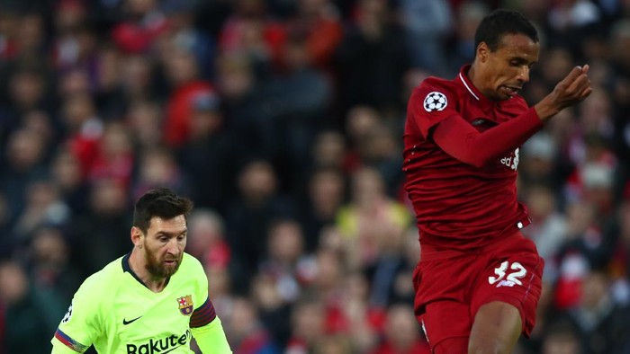 LIVERPOOL, ENGLAND - MAY 07:  Lionel Messi of Barcelona takes on Joel Matip of Liverpool during the UEFA Champions League Semi Final second leg match between Liverpool and Barcelona at Anfield on May 07, 2019 in Liverpool, England. (Photo by Clive Brunskill/Getty Images)
