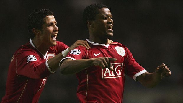 MANCHESTER, UNITED KINGDOM - APRIL 10: Patrice Evra of Manchester United celebrates scoring his team's seventh goal with team mate Cristiano Ronaldo during the UEFA Champions League Quarter Final, second leg match between Manchester United and AS Roma at Old Trafford on April 10, 2007 in Manchester, England. (Photo by Alex Livesey/Getty Images)