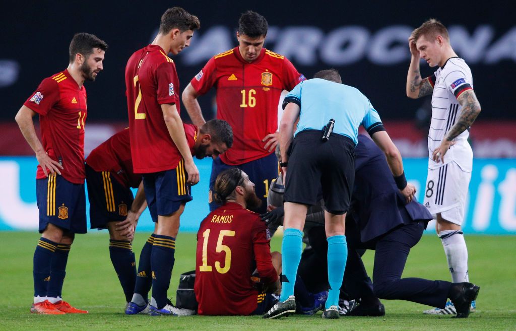 SEVILLE, SPAIN - NOVEMBER 17: Sergio Ramos of Spain receives treatment before being substituted during the UEFA Nations League group stage match between Spain and Germany at Estadio de La Cartuja on November 17, 2020 in Seville, Spain. (Photo by Fran Santiago/Getty Images)