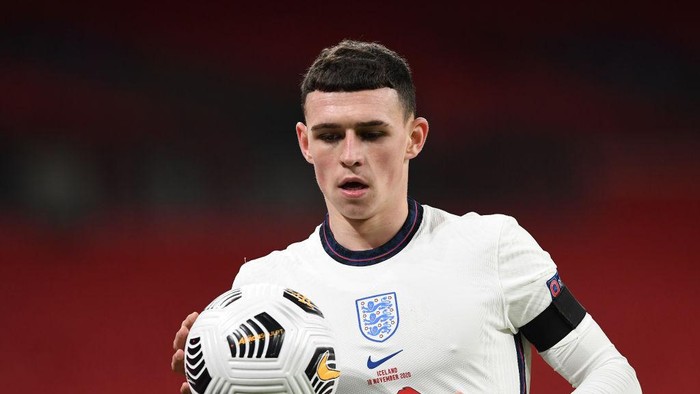 LONDON, ENGLAND - NOVEMBER 18: Phil Foden of England looks on during the UEFA Nations League group stage match between England and Iceland at Wembley Stadium on November 18, 2020 in London, England. Football Stadiums around Europe remain empty due to the Coronavirus Pandemic as Government social distancing laws prohibit fans inside venues resulting in fixtures being played behind closed doors. (Photo by Neil Hall - Pool/Getty Images)