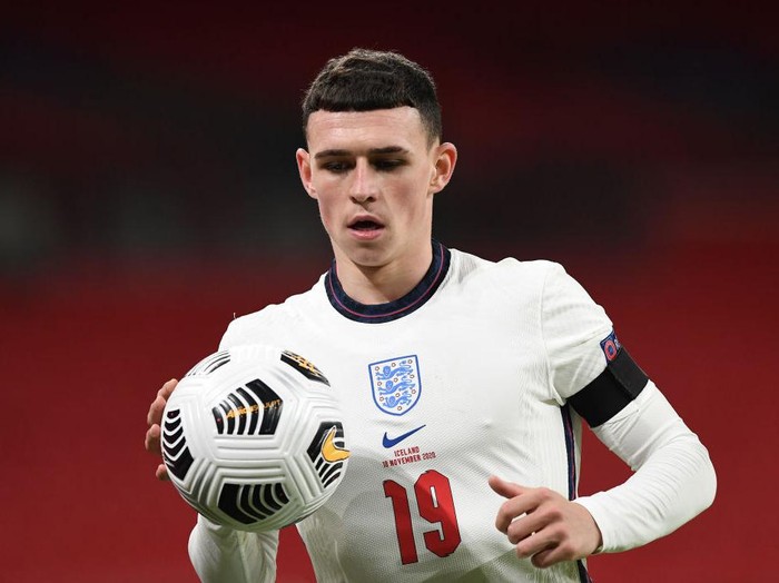 LONDON, ENGLAND - NOVEMBER 18: Phil Foden of England looks on during the UEFA Nations League group stage match between England and Iceland at Wembley Stadium on November 18, 2020 in London, England. Football Stadiums around Europe remain empty due to the Coronavirus Pandemic as Government social distancing laws prohibit fans inside venues resulting in fixtures being played behind closed doors. (Photo by Neil Hall - Pool/Getty Images)