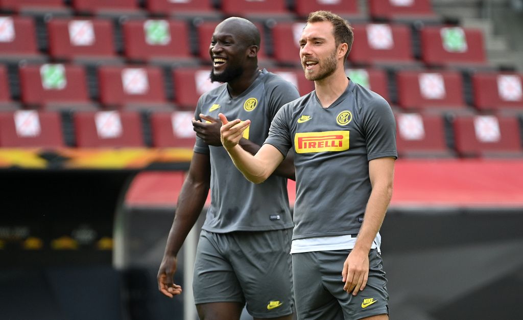 COLOGNE, GERMANY - AUGUST 20: Romelu Lukaku of Inter Milan and Christian Eriksen of Inter Milan react during a training session ahead of their UEFA Europa League match against Sevilla at RheinEnergieStadion on August 20, 2020 in Cologne, Germany. (Photo by Ina Fassbender/Pool via Getty Images)