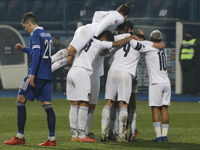 Italy players celebrate after Domenico Berardi scoried his sides second goal during the UEFA Nations League soccer match between Bosnia and Italy, in Sarajevo, Bosnia, Wednesday, Nov. 18, 2020. (AP Photo/Kemal Softic)