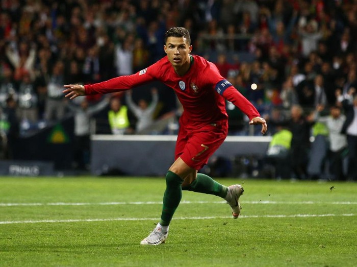 PORTO, PORTUGAL - JUNE 05:  Cristiano Ronaldo of Portugal celebrates after scoring his team's second goal during the UEFA Nations League Semi-Final match between Portugal and Switzerland at Estadio do Dragao on June 05, 2019 in Porto, Portugal. (Photo by Jan Kruger/Getty Images)