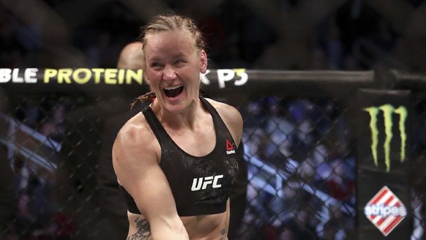 HOUSTON, TEXAS - FEBRUARY 08: Valentina Shevchenko celebrates her technical knock out win against Katlyn Chookagian in their Womens Flyweight Championship bout during UFC 247 at Toyota Center on February 08, 2020 in Houston, Texas.   Ronald Martinez/Getty Images/AFP