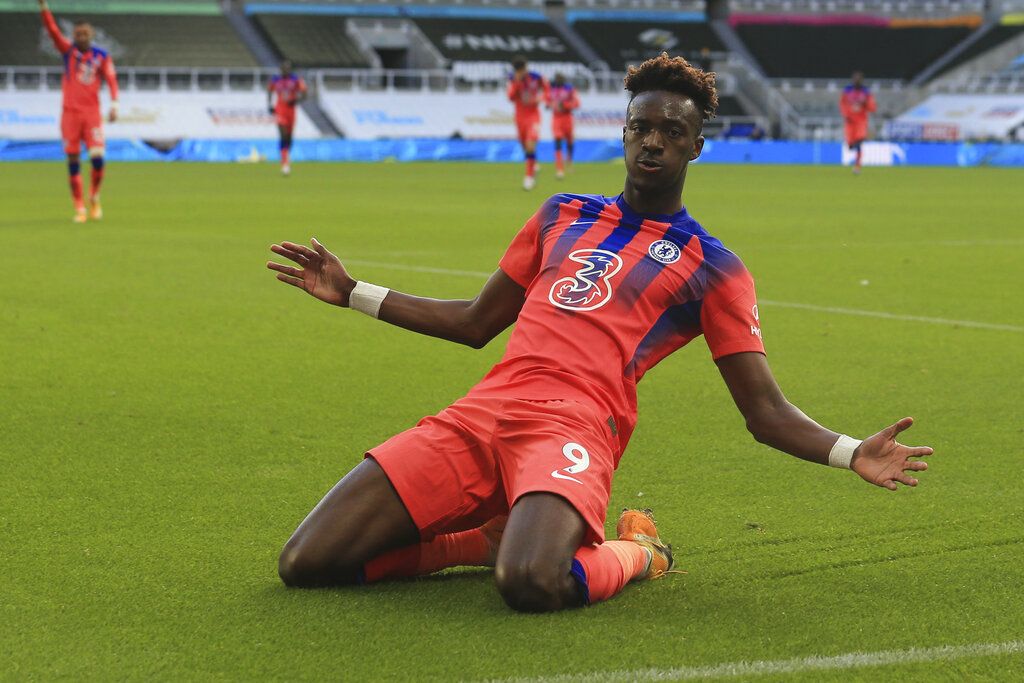 Chelsea's Tammy Abraham celebrates after scoring his side's second goal during the English Premier League soccer match between Newcastle United v Chelsea at the St. James' Park in Newcastle, England, Saturday, Nov. 21, 2020. (Lindsey Parnaby/ Pool via AP)