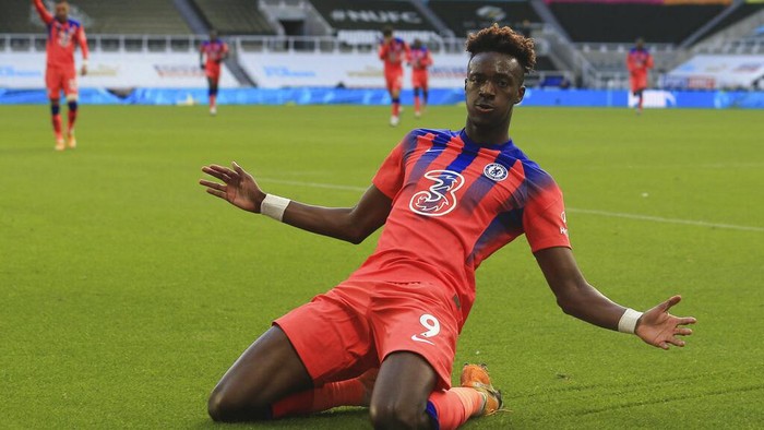 Chelseas Tammy Abraham celebrates after scoring his sides second goal during the English Premier League soccer match between Newcastle United v Chelsea at the St. James Park in Newcastle, England, Saturday, Nov. 21, 2020. (Lindsey Parnaby/ Pool via AP)
