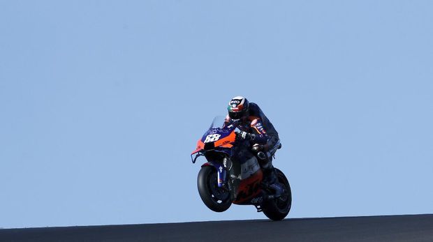 MotoGP rider Miguel Oliveira of Portugal steers his motorcycle during a free practice session for the Portuguese Motorcycle Grand Prix, the last race of the season, at the Algarve International circuit near Portimao, Portugal, Saturday, Nov. 21, 2020. The Portuguese Grand Prix will be held Sunday. (AP Photo/Armando Franca