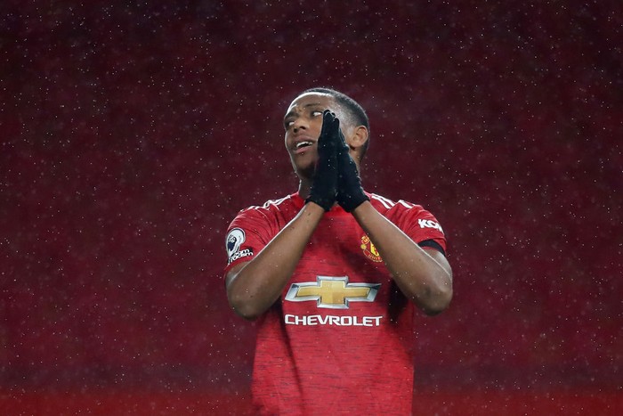 MANCHESTER, ENGLAND - NOVEMBER 21: Anthony Martial of Manchester United reacts during the Premier League match between Manchester United and West Bromwich Albion at Old Trafford on November 21, 2020 in Manchester, England. Sporting stadiums around the UK remain under strict restrictions due to the Coronavirus Pandemic as Government social distancing laws prohibit fans inside venues resulting in games being played behind closed doors. (Photo by Martin Rickett - Pool/Getty Images)