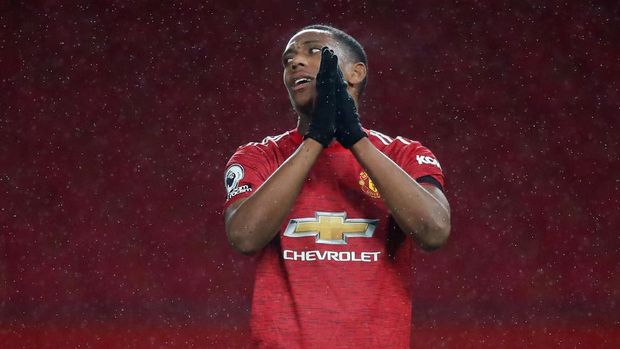 MANCHESTER, INGGRIS - 21 NOVEMBER: Anthony Martial dari Manchester United bereaksi selama pertandingan Liga Premier antara Manchester United dan West Bromwich Albion di Old Trafford pada 21 November 2020 di Manchester, Inggris.  Stadion olahraga di Inggris terus dibatasi secara ketat karena pandemi virus korona karena undang-undang jarak sosial pemerintah melarang penggemar berada di tempat, sehingga pertandingan dimainkan secara tertutup.  (Foto oleh Martin Rickett - Pool / Getty Images)