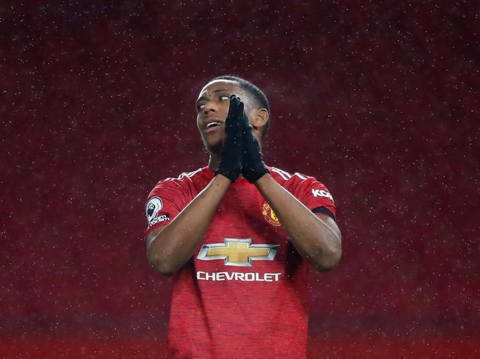 MANCHESTER, ENGLAND - NOVEMBER 21: Anthony Martial of Manchester United reacts during the Premier League match between Manchester United and West Bromwich Albion at Old Trafford on November 21, 2020 in Manchester, England. Sporting stadiums around the UK remain under strict restrictions due to the Coronavirus Pandemic as Government social distancing laws prohibit fans inside venues resulting in games being played behind closed doors. (Photo by Martin Rickett - Pool/Getty Images)