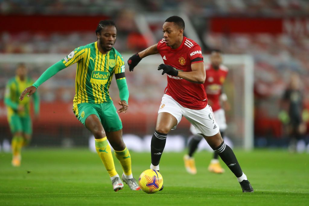 MANCHESTER, ENGLAND - NOVEMBER 21: Anthony Martial of Manchester United reacts during the Premier League match between Manchester United and West Bromwich Albion at Old Trafford on November 21, 2020 in Manchester, England. Sporting stadiums around the UK remain under strict restrictions due to the Coronavirus Pandemic as Government social distancing laws prohibit fans inside venues resulting in games being played behind closed doors. (Photo by Martin Rickett - Pool/Getty Images)