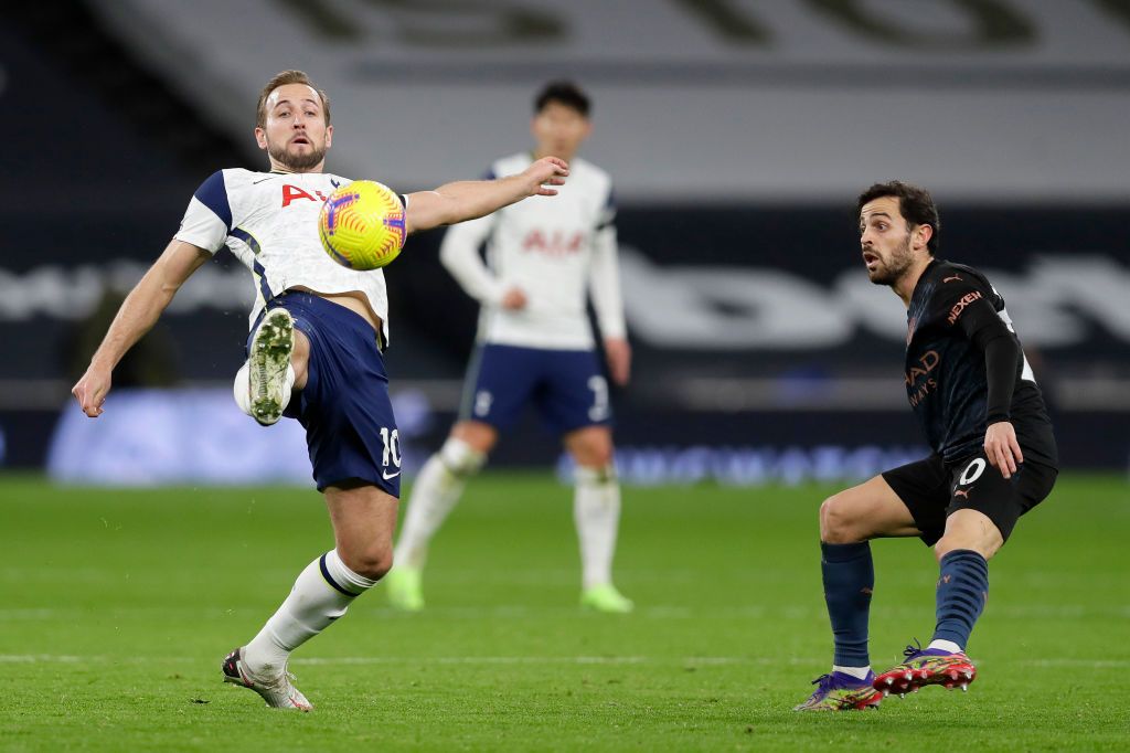 LONDON, ENGLAND - NOVEMBER 21: Harry Kane of Tottenham Hotspur scores a goal which is then disallowed during the Premier League match between Tottenham Hotspur and Manchester City at Tottenham Hotspur Stadium on November 21, 2020 in London, England. Sporting stadiums around the UK remain under strict restrictions due to the Coronavirus Pandemic as Government social distancing laws prohibit fans inside venues resulting in games being played behind closed doors. (Photo Neil Hall - by Pool/Getty Images)