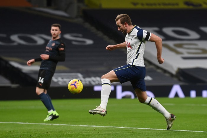 LONDON, ENGLAND - NOVEMBER 21: Harry Kane of Tottenham Hotspur scores a goal which is then disallowed during the Premier League match between Tottenham Hotspur and Manchester City at Tottenham Hotspur Stadium on November 21, 2020 in London, England. Sporting stadiums around the UK remain under strict restrictions due to the Coronavirus Pandemic as Government social distancing laws prohibit fans inside venues resulting in games being played behind closed doors. (Photo Neil Hall - by Pool/Getty Images)