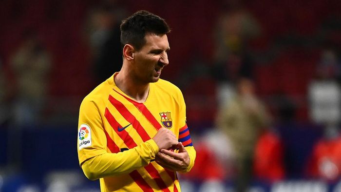 Messi Barcelonas Argentinian forward Lionel Messi reacts at the end of the Spanish League football match between Club Atletico de Madrid and FC Barcelona at the Wanda Metropolitano stadium in Madrid on November 21, 2020. (Photo by GABRIEL BOUYS / AFP)
