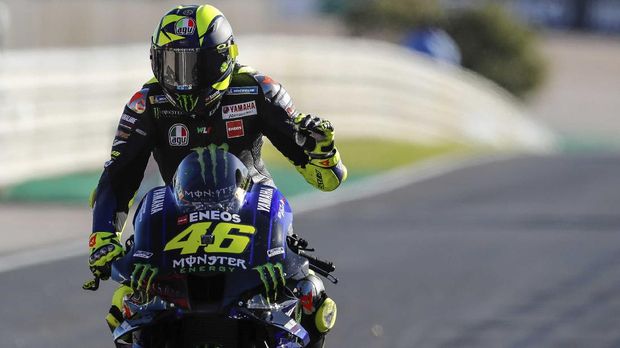 MotoGP rider Valentino Rossi of Italy reacts at the end of the Portuguese Motorcycle Grand Prix, the last race of the season, at the Algarve International circuit near Portimao, Portugal, Sunday, Nov. 22, 2020. (AP Photo/Armando Franca)