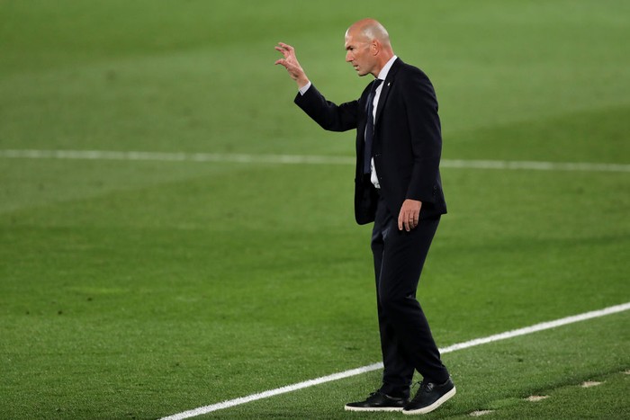 MADRID, SPAIN - SEPTEMBER 30: Zinedine Zidane, Head Coach of Real Madrid reacts during the La Liga Santander match between Real Madrid and Real Valladolid CF at Estadio Santiago Bernabeu on September 30, 2020 in Madrid, Spain. Football Stadiums around Europe remain empty due to the Coronavirus Pandemic as Government social distancing laws prohibit fans inside venues resulting in fixtures being played behind closed doors. (Photo by Gonzalo Arroyo Moreno/Getty Images)