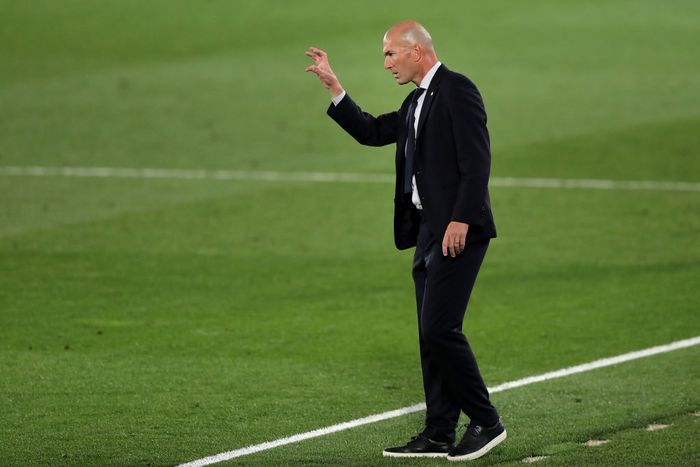 Zinedine Zidane MADRID, SPAIN - SEPTEMBER 30: Zinedine Zidane, Head Coach of Real Madrid reacts during the La Liga Santander match between Real Madrid and Real Valladolid CF at Estadio Santiago Bernabeu on September 30, 2020 in Madrid, Spain. Football Stadiums around Europe remain empty due to the Coronavirus Pandemic as Government social distancing laws prohibit fans inside venues resulting in fixtures being played behind closed doors. (Photo by Gonzalo Arroyo Moreno/Getty Images)