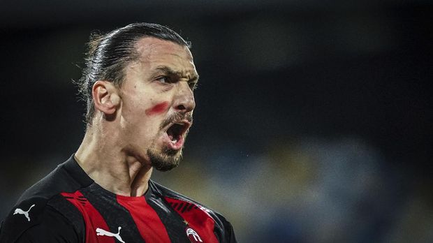 AC Milan's Zlatan Ibrahimovic celebrates scoring during the Serie A soccer match between Napoli and AC Milan, at the San Paolo Stadium in Naples, Italy, Sunday, Nov. 22, 2020. (Alessandro Garofalo/LaPresse via AP)