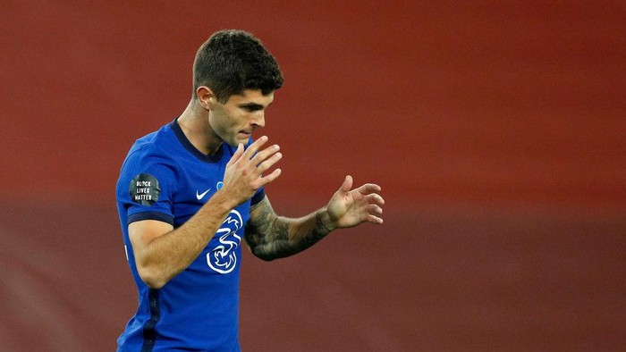 LIVERPOOL, ENGLAND - JULY 22: Christian Pulisic of Chelsea reacts during the Premier League match between Liverpool FC and Chelsea FC at Anfield on July 22, 2020 in Liverpool, England. Football Stadiums around Europe remain empty due to the Coronavirus Pandemic as Government social distancing laws prohibit fans inside venues resulting in all fixtures being played behind closed doors. (Photo by Phil Noble/Pool via Getty Images)