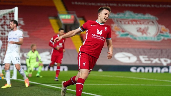 LIVERPOOL, ENGLAND - NOVEMBER 22: Diogo Jota of Liverpool celebrates scoring their teams second goal during the Premier League match between Liverpool and Leicester City at Anfield on November 22, 2020 in Liverpool, England. Sporting stadiums around the UK remain under strict restrictions due to the Coronavirus Pandemic as Government social distancing laws prohibit fans inside venues resulting in games being played behind closed doors. (Photo by Jon Super - Pool/Getty Images)