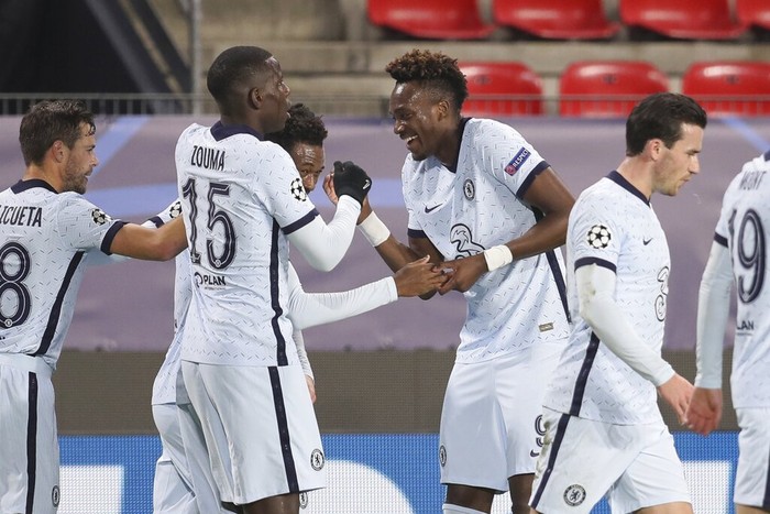 Chelsea players celebrate the opening goal of their team during the Champions League, group E soccer match between Rennes and Chelsea at the Roazhon Park stadium in Rennes, France, Tuesday, Nov. 24, 2020. (AP Photo/David Vincent)
