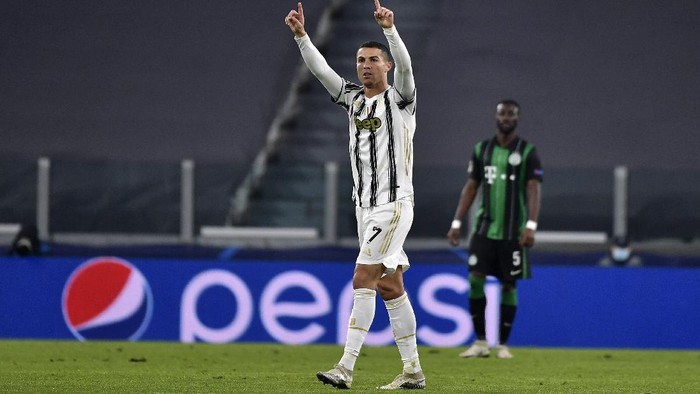 Juventus Cristiano Ronaldo celebrates after scoring during the Champions league, group G soccer match between Juventus and Ferencvaros, at the Allianz Stadium in Turin, Italy, Tuesday, Nov. 24, 2020. (Marco Alpozzi/LaPresse via AP)