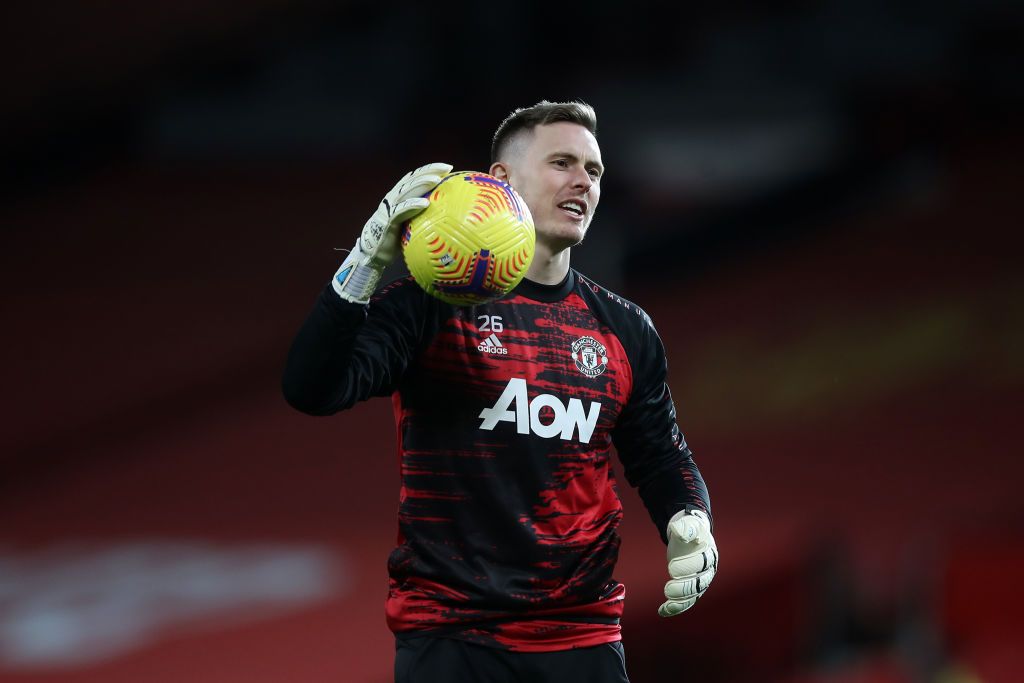 MANCHESTER, ENGLAND - NOVEMBER 21: Dean Henderson of Manchester United warms up prior to the Premier League match between Manchester United and West Bromwich Albion at Old Trafford on November 21, 2020 in Manchester, England. Sporting stadiums around the UK remain under strict restrictions due to the Coronavirus Pandemic as Government social distancing laws prohibit fans inside venues resulting in games being played behind closed doors. (Photo by Martin Rickett - Pool/Getty Images)