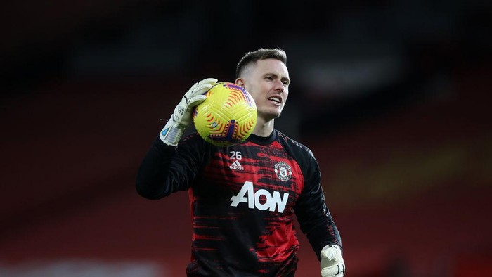 MANCHESTER, ENGLAND - NOVEMBER 21: Dean Henderson of Manchester United warms up prior to the Premier League match between Manchester United and West Bromwich Albion at Old Trafford on November 21, 2020 in Manchester, England. Sporting stadiums around the UK remain under strict restrictions due to the Coronavirus Pandemic as Government social distancing laws prohibit fans inside venues resulting in games being played behind closed doors. (Photo by Martin Rickett - Pool/Getty Images)