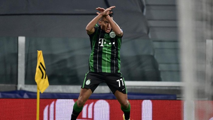 Ferencvaros Myrto Uzuni celebrates after scoring during the Champions league, group G soccer match between Juventus and Ferencvaros, at the Allianz Stadium in Turin, Italy, Tuesday, Nov. 24, 2020. (Marco Alpozzi/LaPresse via AP)