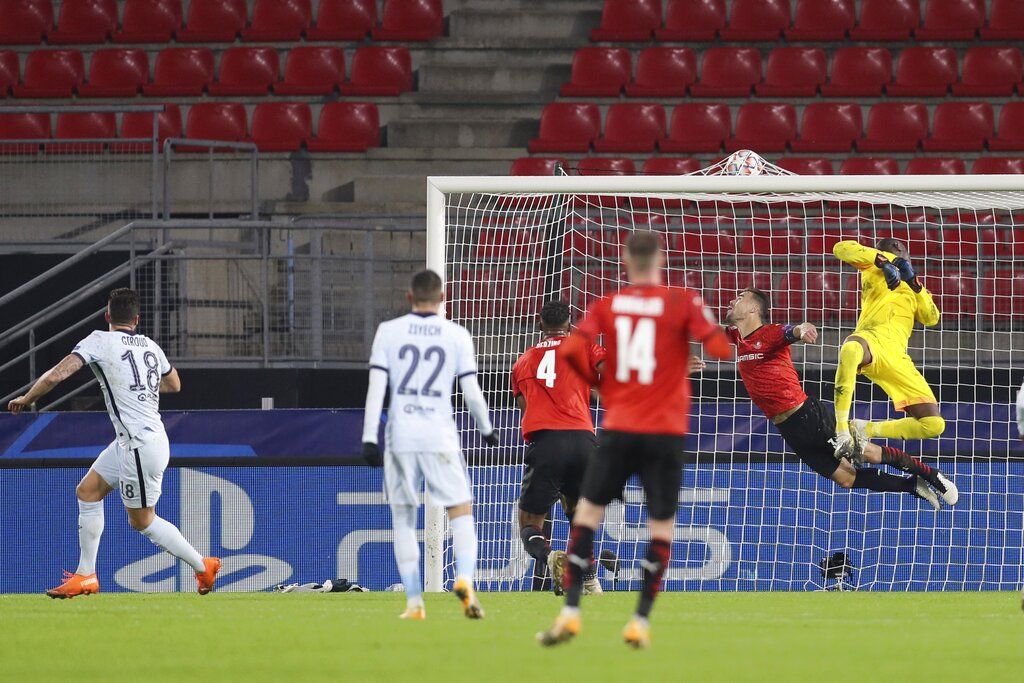 Chelsea's Olivier Giroud, center, celebrates with his teammates after scoring his side's second goal during the Champions League, group E soccer match between Rennes and Chelsea at the Roazhon Park stadium in Rennes, France, Tuesday, Nov. 24, 2020. Chelsea won 2-1. (AP Photo/David Vincent)