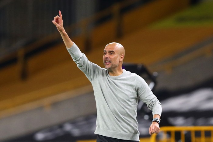 WOLVERHAMPTON, ENGLAND - SEPTEMBER 21: Pep Guardiola, Manager of Manchester City reacts during the Premier League match between Wolverhampton Wanderers and Manchester City at Molineux on September 21, 2020 in Wolverhampton, England. (Photo by Marc Atkins/Getty Images)