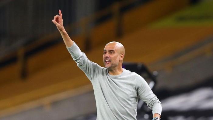 WOLVERHAMPTON, ENGLAND - SEPTEMBER 21: Pep Guardiola, Manager of Manchester City reacts during the Premier League match between Wolverhampton Wanderers and Manchester City at Molineux on September 21, 2020 in Wolverhampton, England. (Photo by Marc Atkins/Getty Images)