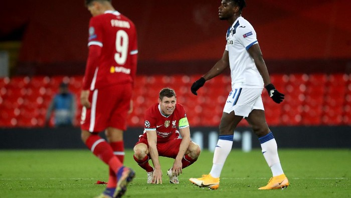 LIVERPOOL, ENGLAND - NOVEMBER 25: James Milner of Liverpool reacts to defeat after the UEFA Champions League Group D stage match between Liverpool FC and Atalanta BC at Anfield on November 25, 2020 in Liverpool, England. Sporting stadiums around the UK remain under strict restrictions due to the Coronavirus Pandemic as Government social distancing laws prohibit fans inside venues resulting in games being played behind closed doors. (Photo by Martin Rickett - Pool/Getty Images)