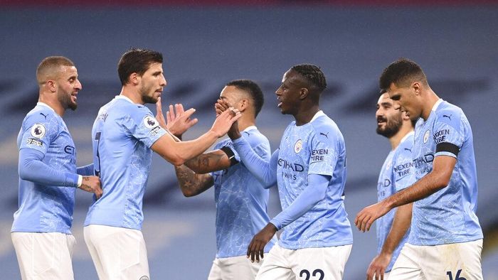Manchester City Manchester Citys Benjamin Mendy celebrates with teammates after scoring his sides third goal during the English Premier League soccer match between Manchester City and Burnley at the Etihad stadium in Manchester, England, Saturday, Nov. 28, 2020. (Laurence Griffiths/Pool via AP)