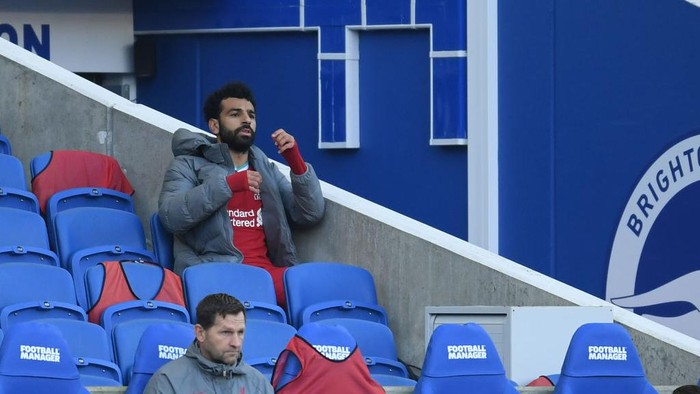 BRIGHTON, ENGLAND - NOVEMBER 28: Mohamed Salah of Liverpool reacts on the bench during the Premier League match between Brighton & Hove Albion and Liverpool at American Express Community Stadium on November 28, 2020 in Brighton, England. Sporting stadiums around the UK remain under strict restrictions due to the Coronavirus Pandemic as Government social distancing laws prohibit fans inside venues resulting in games being played behind closed doors. (Photo by Mike Hewitt/Getty Images)