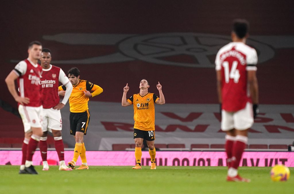 LONDON, ENGLAND - NOVEMBER 29: Daniel Podence of Wolverhampton Wanderers celebrates after scoring their team's second goal during the Premier League match between Arsenal and Wolverhampton Wanderers at Emirates Stadium on November 29, 2020 in London, England. Sporting stadiums around the UK remain under strict restrictions due to the Coronavirus Pandemic as Government social distancing laws prohibit fans inside venues resulting in games being played behind closed doors. (Photo by John Walton - Pool/Getty Images)
