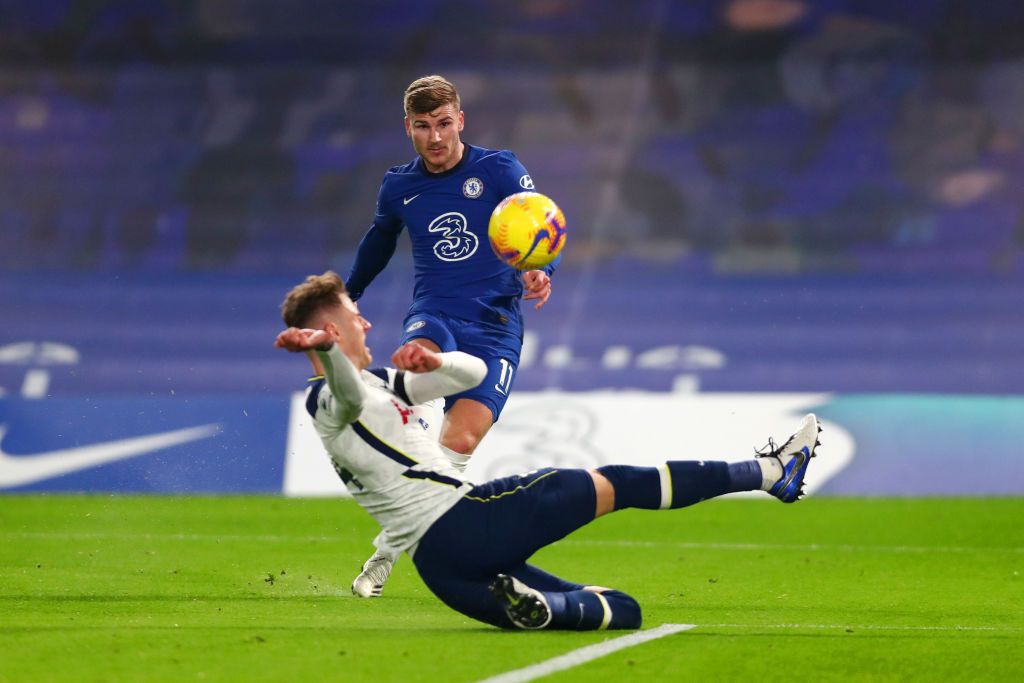 LONDON, ENGLAND - NOVEMBER 29: Chelsea's Timo Werner has a goal disallowed for offside when Tottenham Hotspur's Joe Rodon slips during the Premier League match between Chelsea and Tottenham Hotspur at Stamford Bridge on November 29, 2020 in London England.  Sports stadiums across the UK remain under strict restrictions due to the coronavirus pandemic, as government social distancing laws prohibit fans within venues, causing games to be played behind closed doors.  (Photo by Clive Rose / Getty Images)