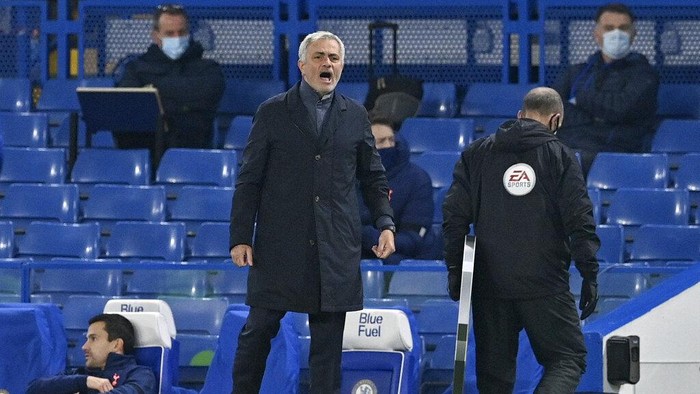 Tottenhams manager Jose Mourinho stands by the touchline during the English Premier League soccer match between Chelsea and Tottenham Hotspur at Stamford Bridge in London, England, Sunday, Nov. 29, 2020. (Justin Tallis/Pool via AP)