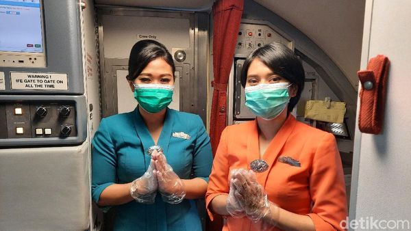 Suasana Terbang Naik Garuda Indonesia Dilengkapi Protokol Kesehatan