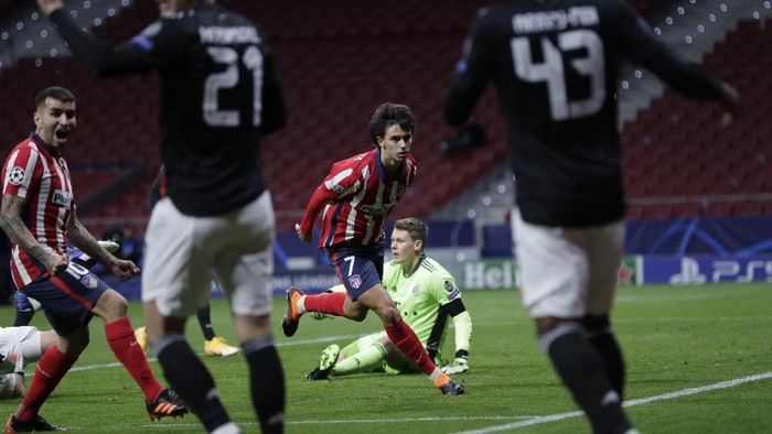 Atletico Madrids Joao Felix celebrates after scoring his sides opening goal during the Champions League group A soccer match between Atletico Madrid and Bayern Munich at the Wanda Metropolitano stadium in Madrid, Spain, Tuesday, Dec. 1, 2020. (AP Photo/Bernat Armangue)