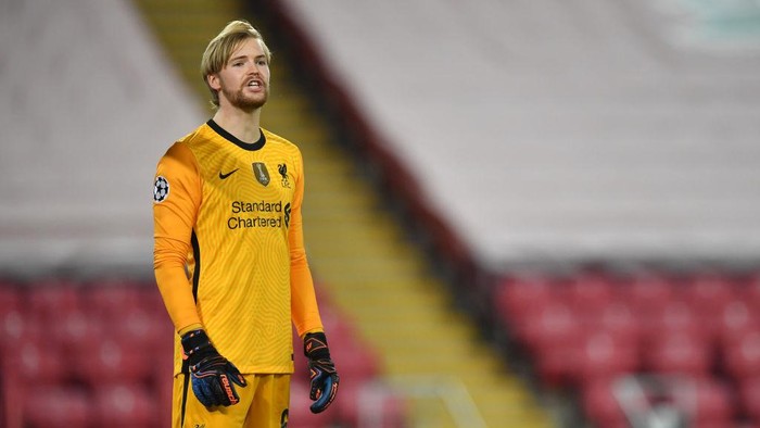 LIVERPOOL, ENGLAND - DECEMBER 01: Caoimhin Kelleher of Liverpool reacts during the UEFA Champions League Group D stage match between Liverpool FC and Ajax Amsterdam at Anfield on December 01, 2020 in Liverpool, England. Sporting stadiums around the UK remain under strict restrictions due to the Coronavirus Pandemic as Government social distancing laws prohibit fans inside venues resulting in games being played behind closed doors. (Photo by Paul Ellis - Pool/Getty Images)