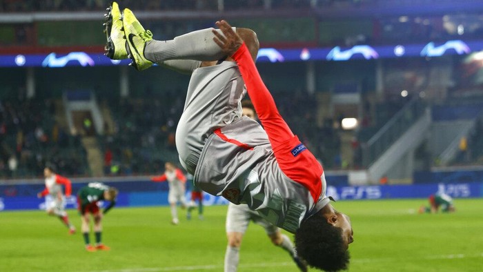 Salzburgs Karim Adeyemi celebrates after scoring the third goal during the Champions League, group A, soccer match between Lokomotiv Moscow and RB Salzburg at the Lokomotiv stadium in Moscow, Russia, Tuesday, Dec. 1, 2020. (Maxim Shemetov/Pool via AP)