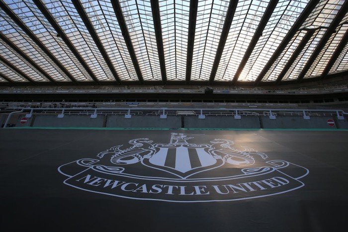 NEWCASTLE UPON TYNE, ENGLAND - JUNE 24: A view of the Newcastle United logo is seen in the stands prior to the Premier League match between Newcastle United and Aston Villa at St. James Park on June 24, 2020 in Newcastle upon Tyne, United Kingdom. (Photo by Lindsey Parnaby/Pool via Getty Images)